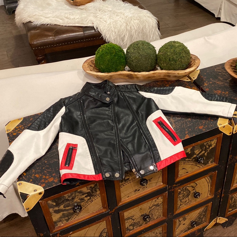 Stylish Black and White Leather Jacket with Red Accents